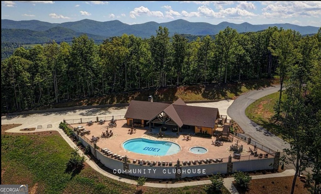 Lot 251 Ridge Pointe Way Blairsville, GA 30512 - Photo 13 of 18 a view of a chairs and table in the patio