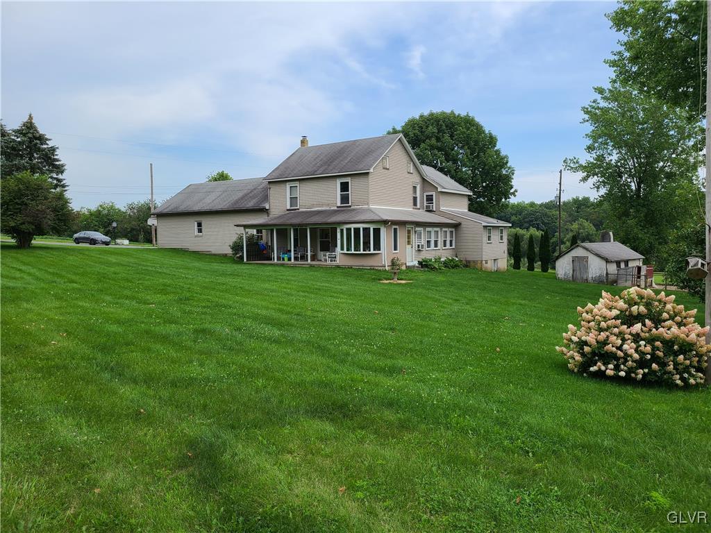 2301 West Best Road Bath, PA 18014 - Photo 1 of 14 a view of a house with a garden