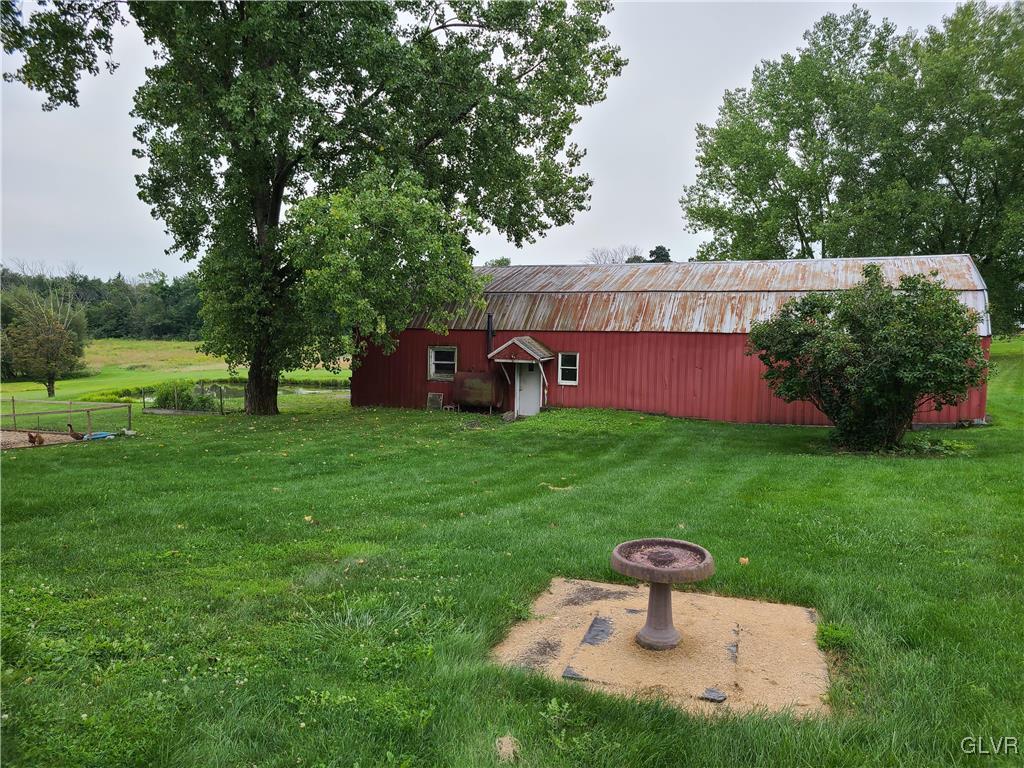 2301 West Best Road Bath, PA 18014 - Photo 3 of 14 a front view of a house with garden