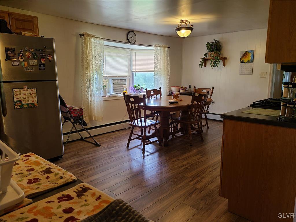 2301 West Best Road Bath, PA 18014 - Photo 5 of 14 a view of a dining room with furniture and wooden floor