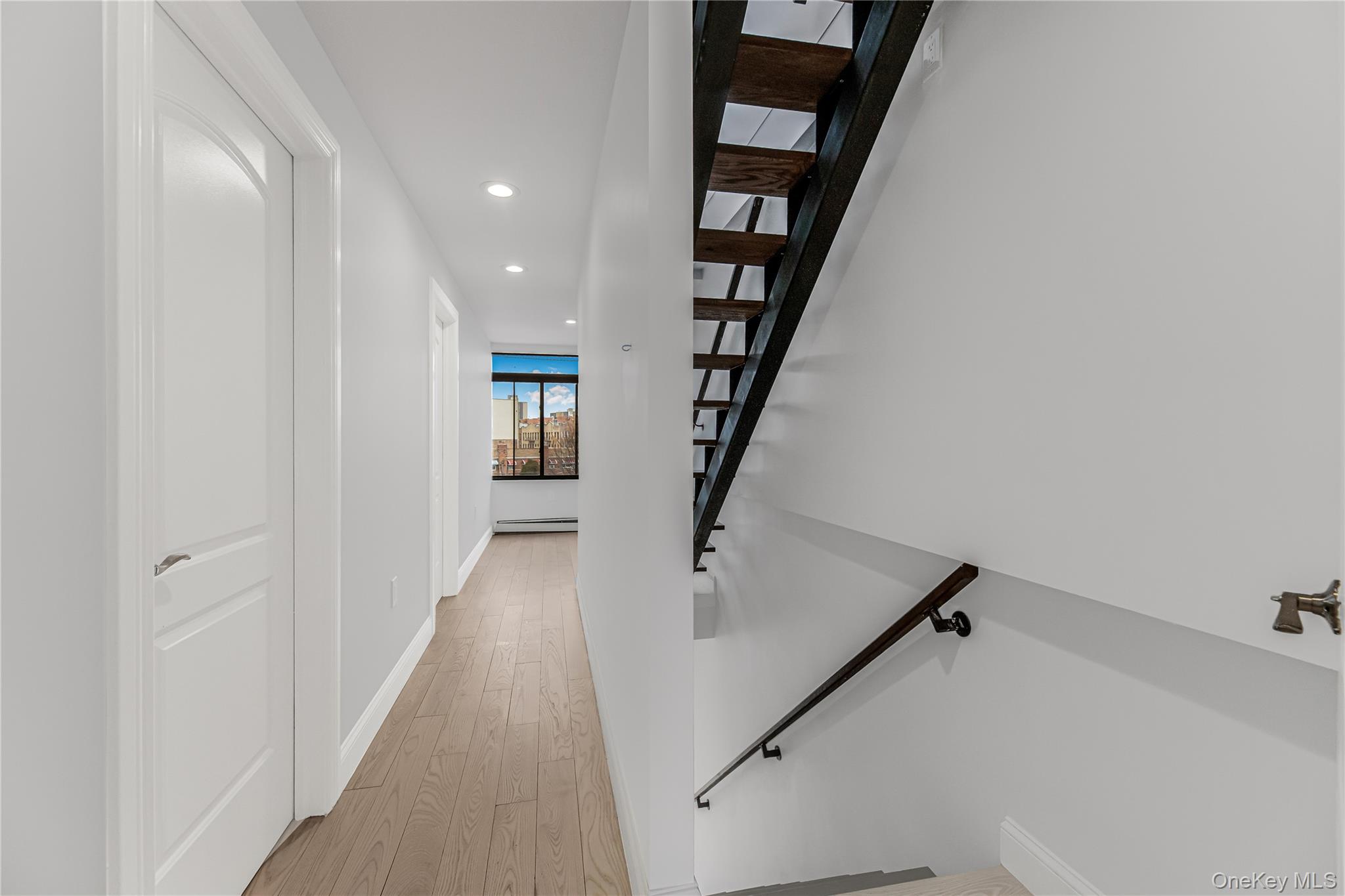 3067 Williamsbridge Road Bronx, NY 10467 - Photo 9 of 29 wooden floor and an entryway