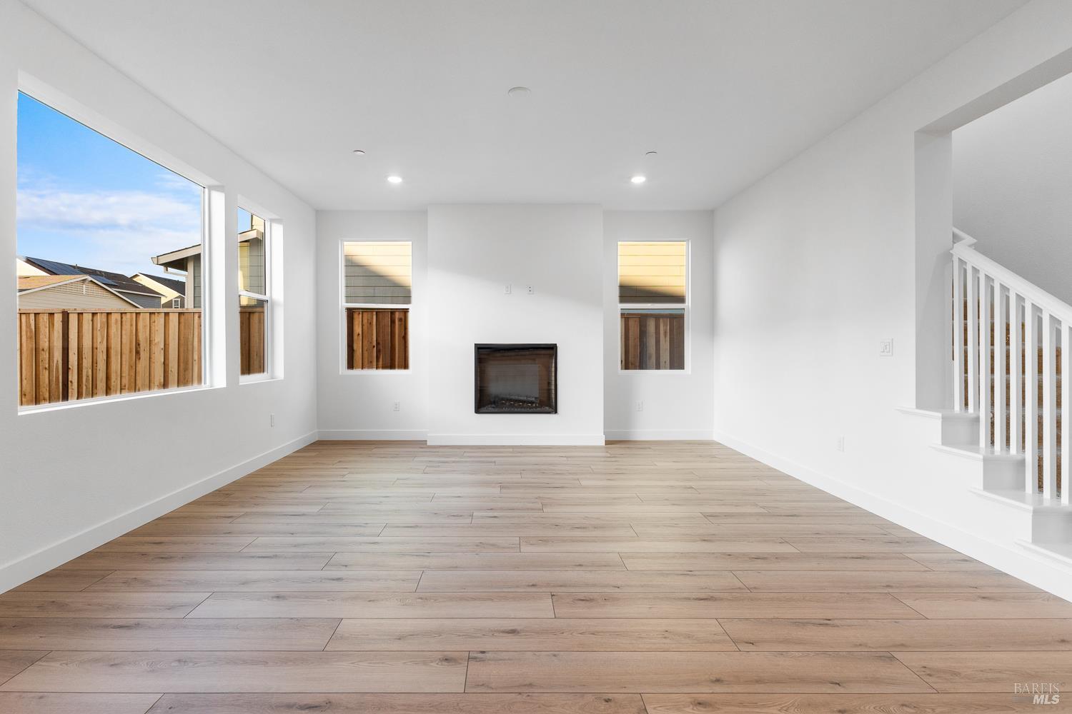 7337 Willowglen Drive Rohnert Park, CA 94928 - Photo 15 of 31 a view of an empty room with wooden floor and a window