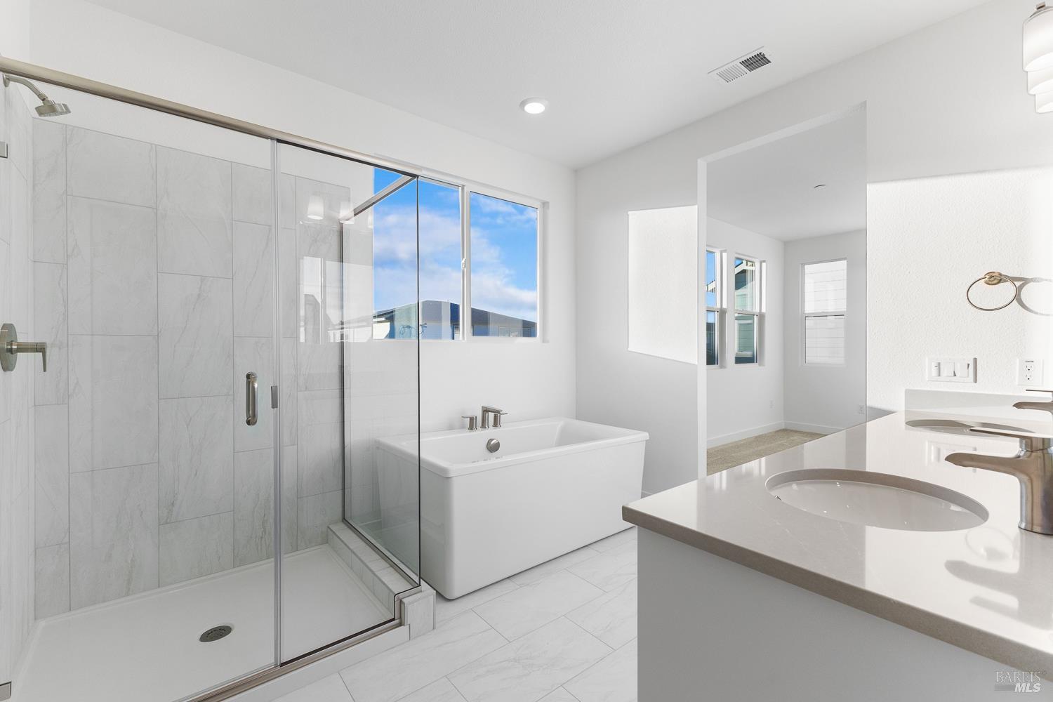 7337 Willowglen Drive Rohnert Park, CA 94928 - Photo 21 of 31 a bathroom with a granite countertop sink mirror and shower
