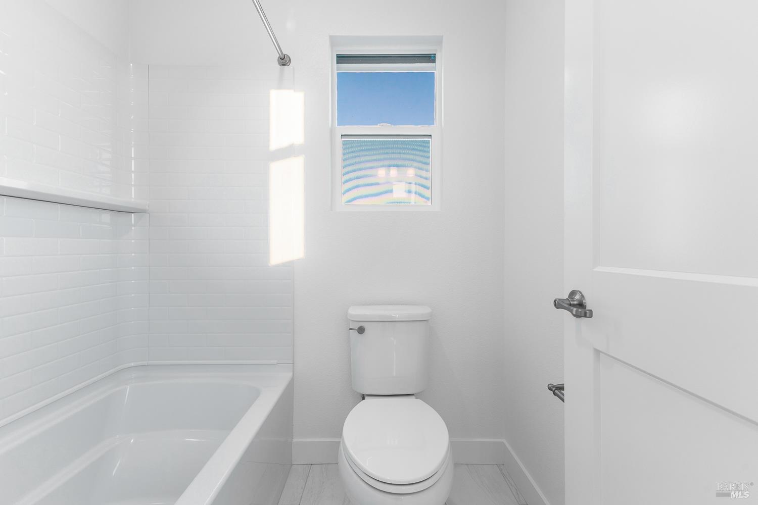 7337 Willowglen Drive Rohnert Park, CA 94928 - Photo 28 of 31 a white toilet sitting next to a bath tub