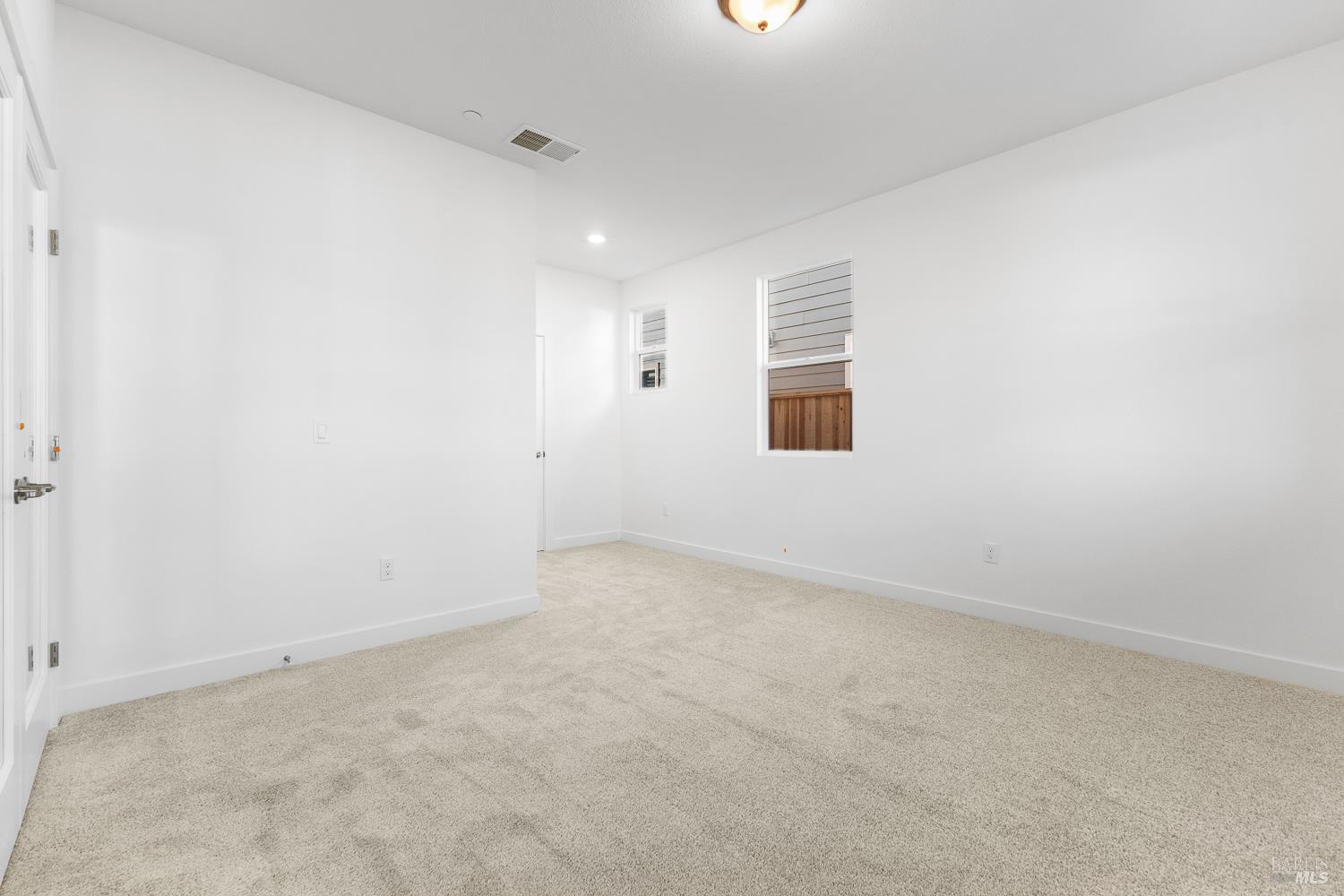 7337 Willowglen Drive Rohnert Park, CA 94928 - Photo 3 of 31 an empty room with windows
