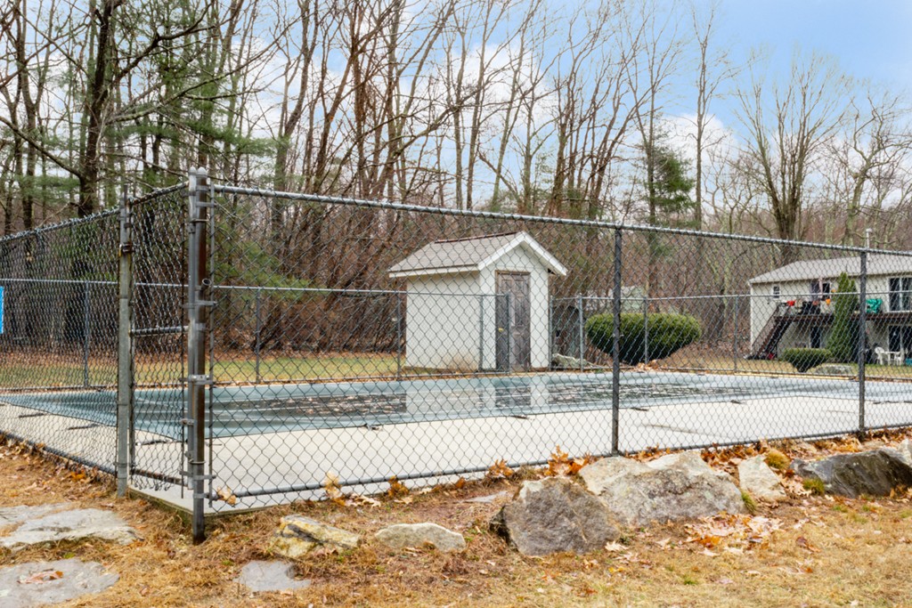 93 Center Depot Road, Unit 55 Charlton, MA 01507 - Photo 16 of 16 a view of a park with iron fence