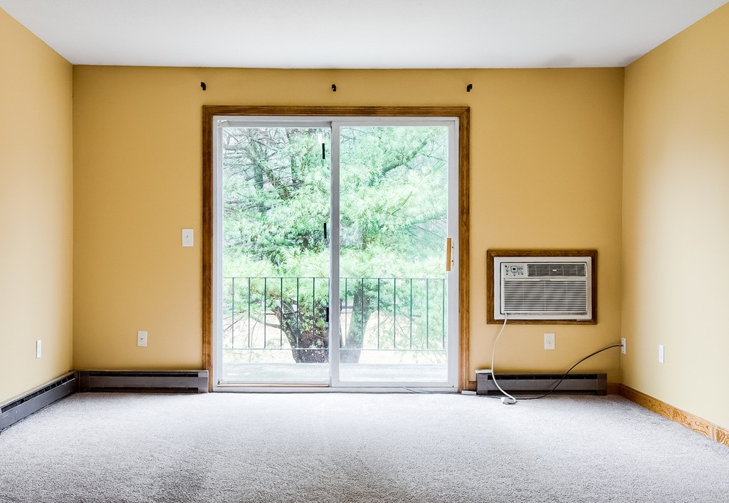 93 Center Depot Road, Unit 55 Charlton, MA 01507 - Photo 5 of 16 a view of an empty room with a window