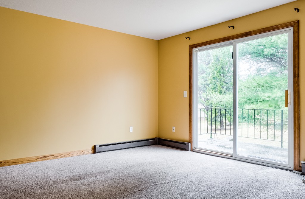 93 Center Depot Road, Unit 55 Charlton, MA 01507 - Photo 6 of 16 a view of an empty room with a window
