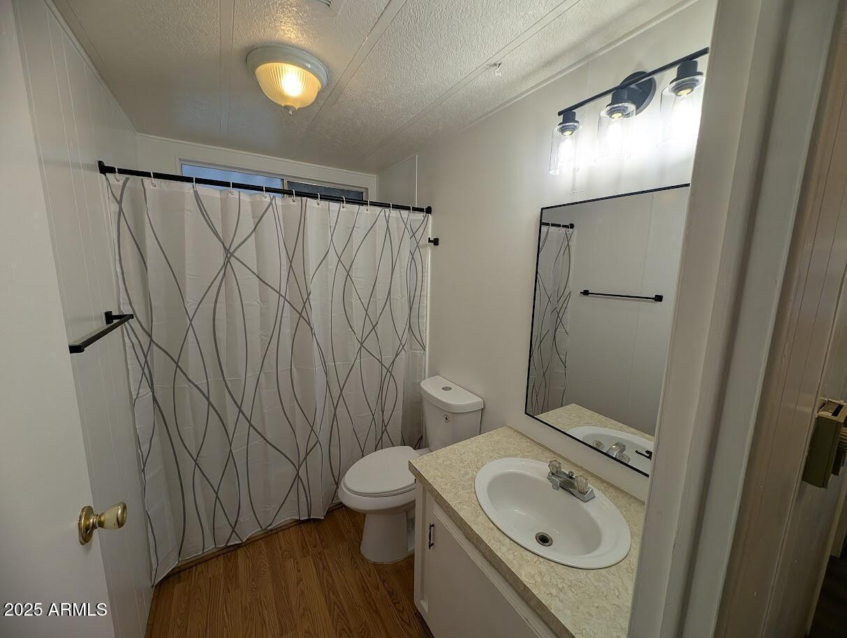 18003 North 2nd Street Phoenix, AZ 85022 - Photo 12 of 31 a bathroom with a sink a toilet and shower