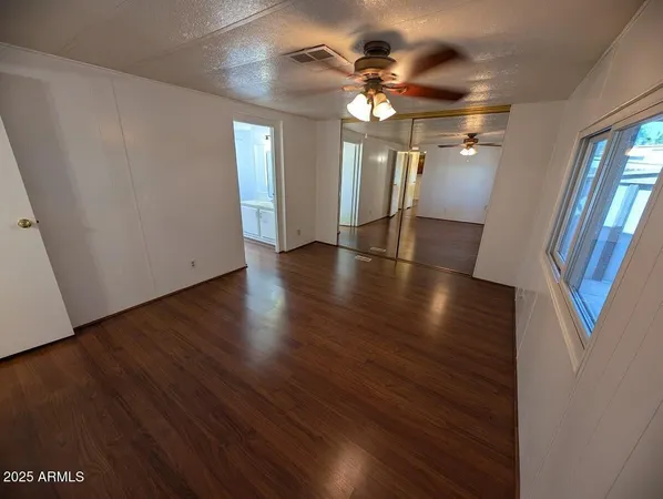 a view of a kitchen from the hallway