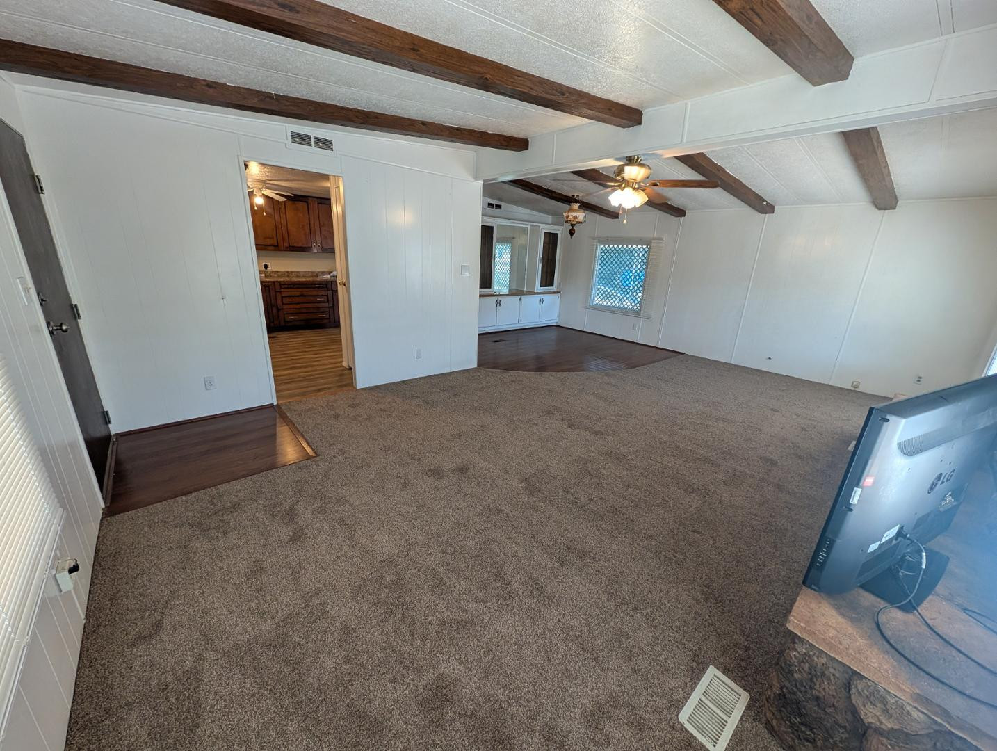 18003 North 2nd Street Phoenix, AZ 85022 - Photo 24 of 31 a view of a livingroom with furniture and ceiling fan