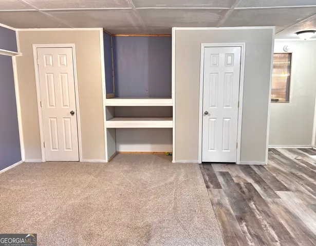 an empty room with closet