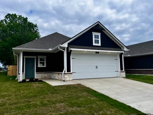 a front view of house with yard