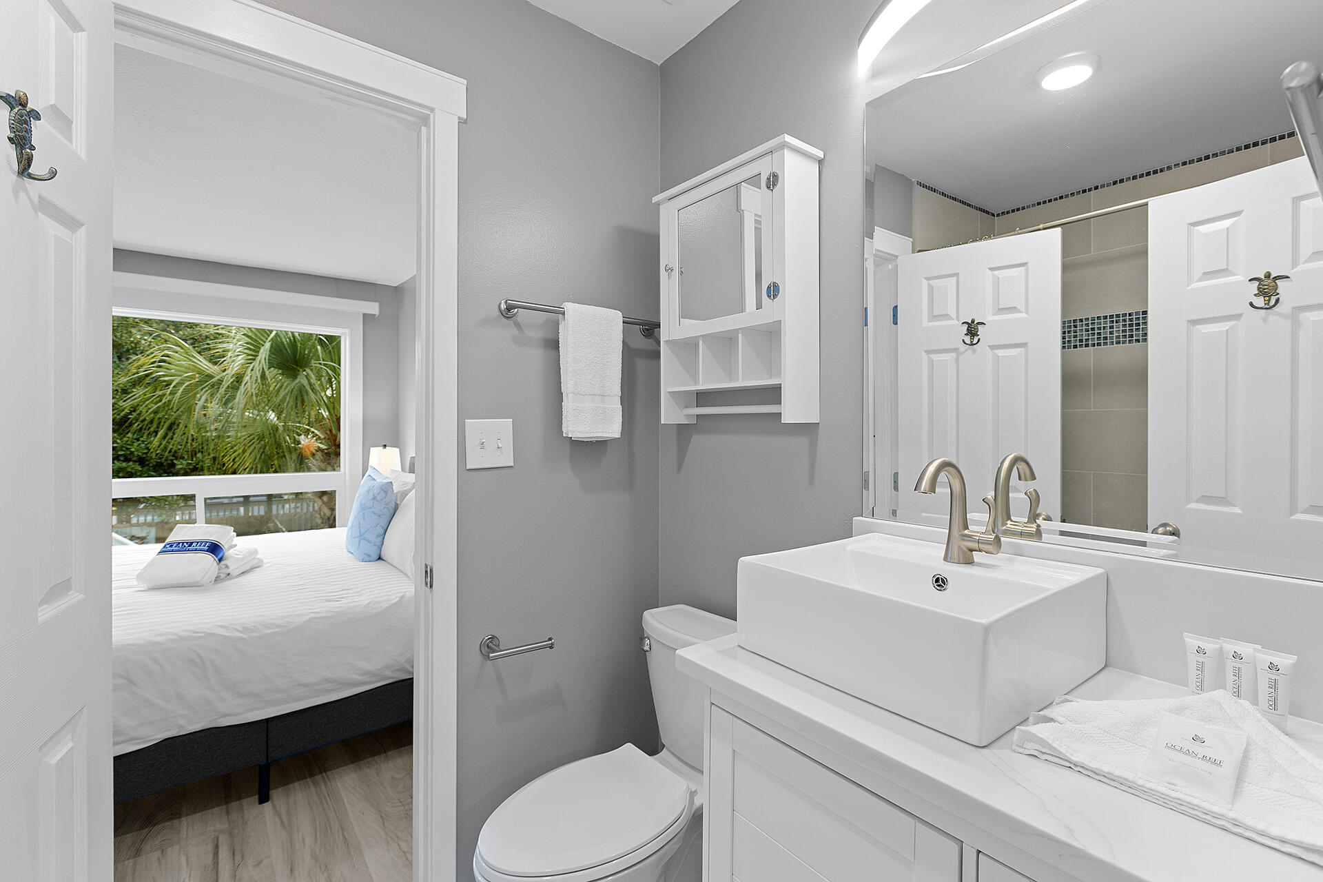 126 Hotz Avenue, Unit 5 Santa Rosa Beach, FL 32459 - Photo 9 of 13 a bathroom with a sink toilet and tub