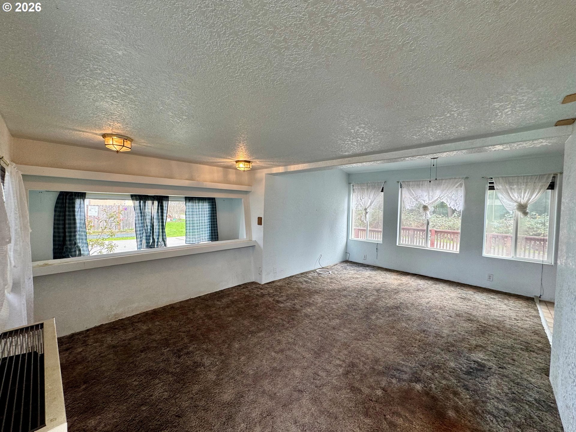 95691 Saunders Creek Road, Unit 36 Gold Beach, OR 97444 - Photo 6 of 23 Living Room/Dining Room