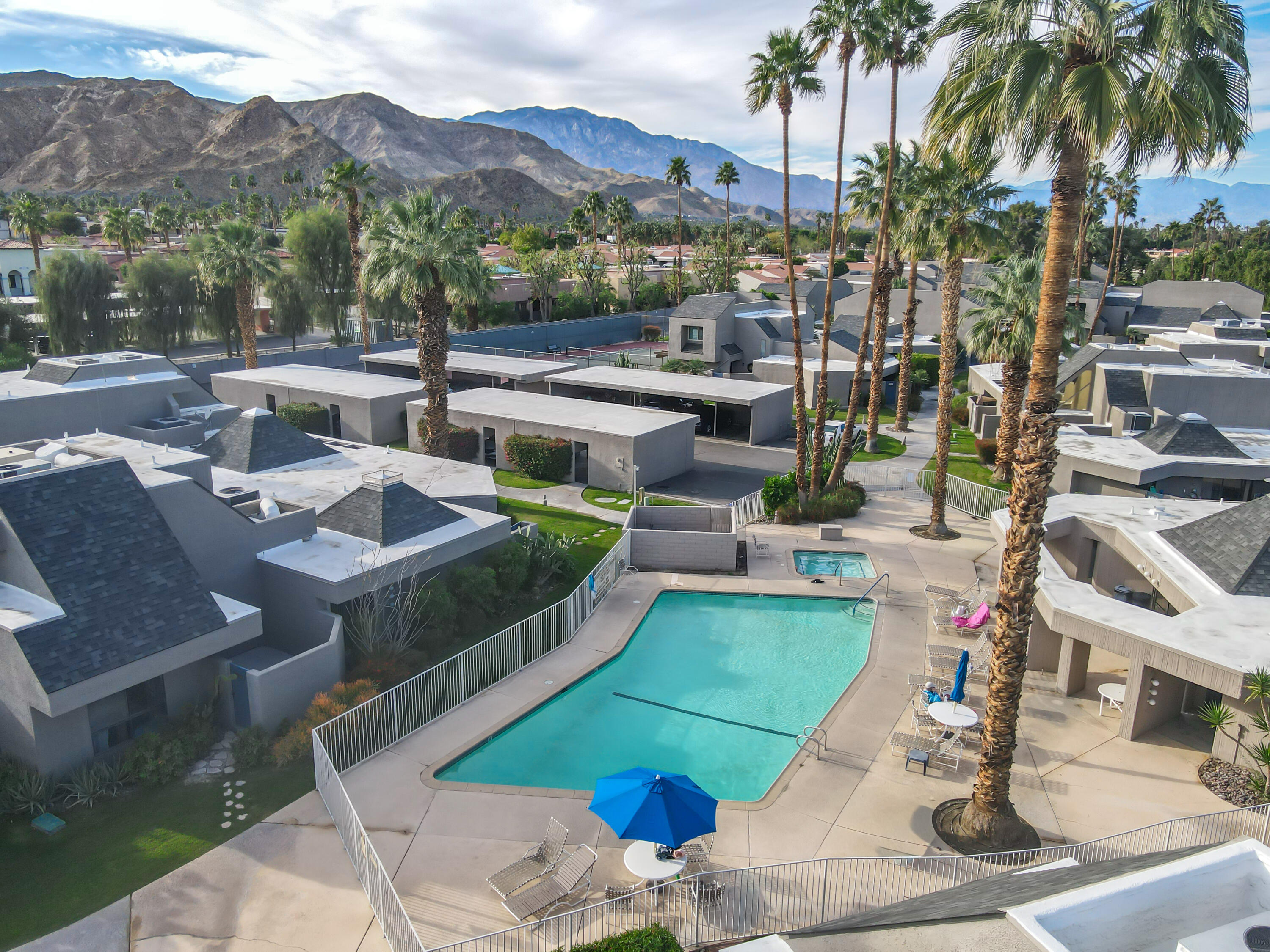71990 Eleanora Lane Rancho Mirage, CA 92270 - Photo 17 of 22 a view of a house with a swimming pool