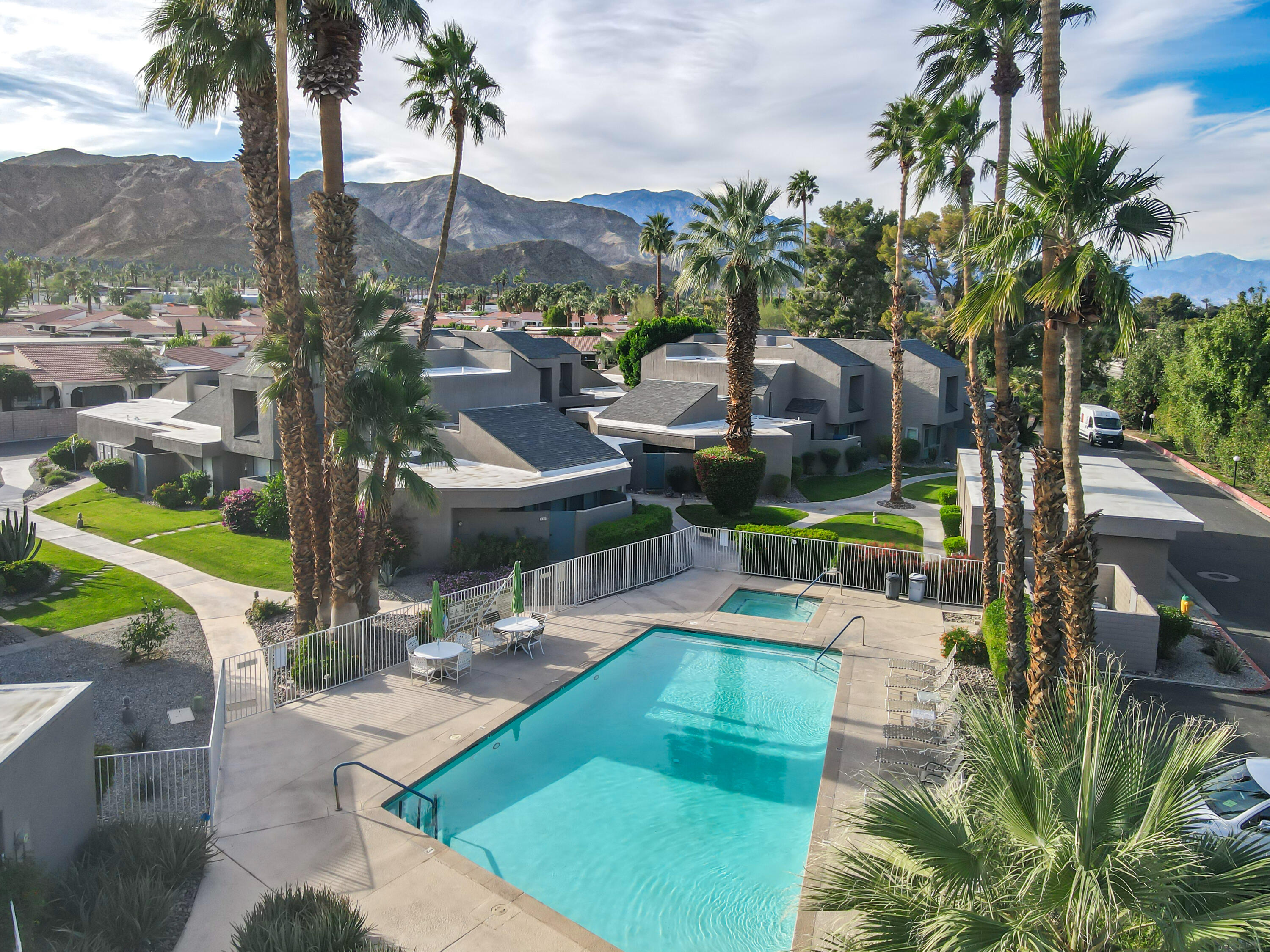 71990 Eleanora Lane Rancho Mirage, CA 92270 - Photo 18 of 22 a view of a swimming pool with a patio and a garden