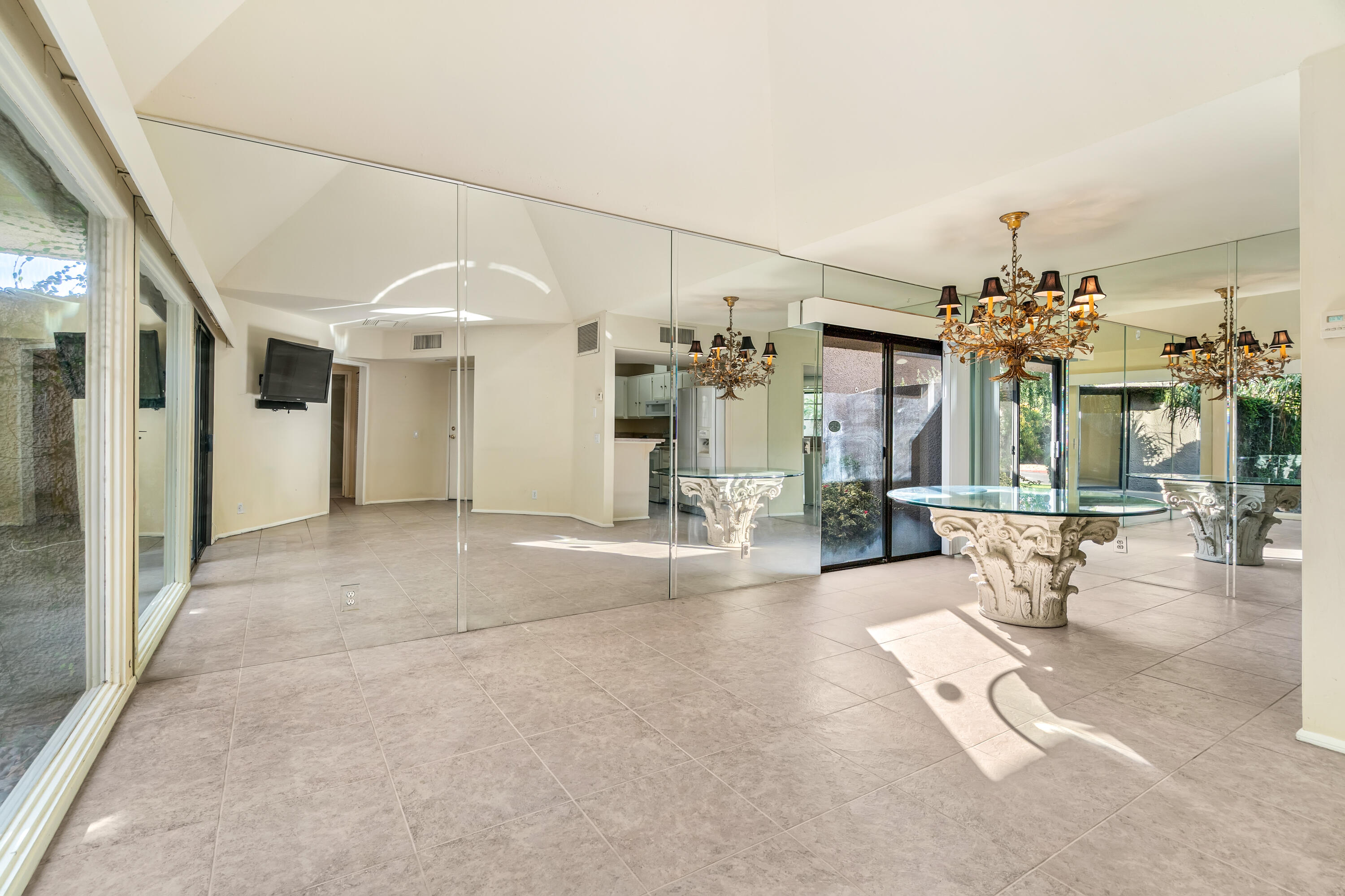 71990 Eleanora Lane Rancho Mirage, CA 92270 - Photo 4 of 22 a view of a living room and chandelier