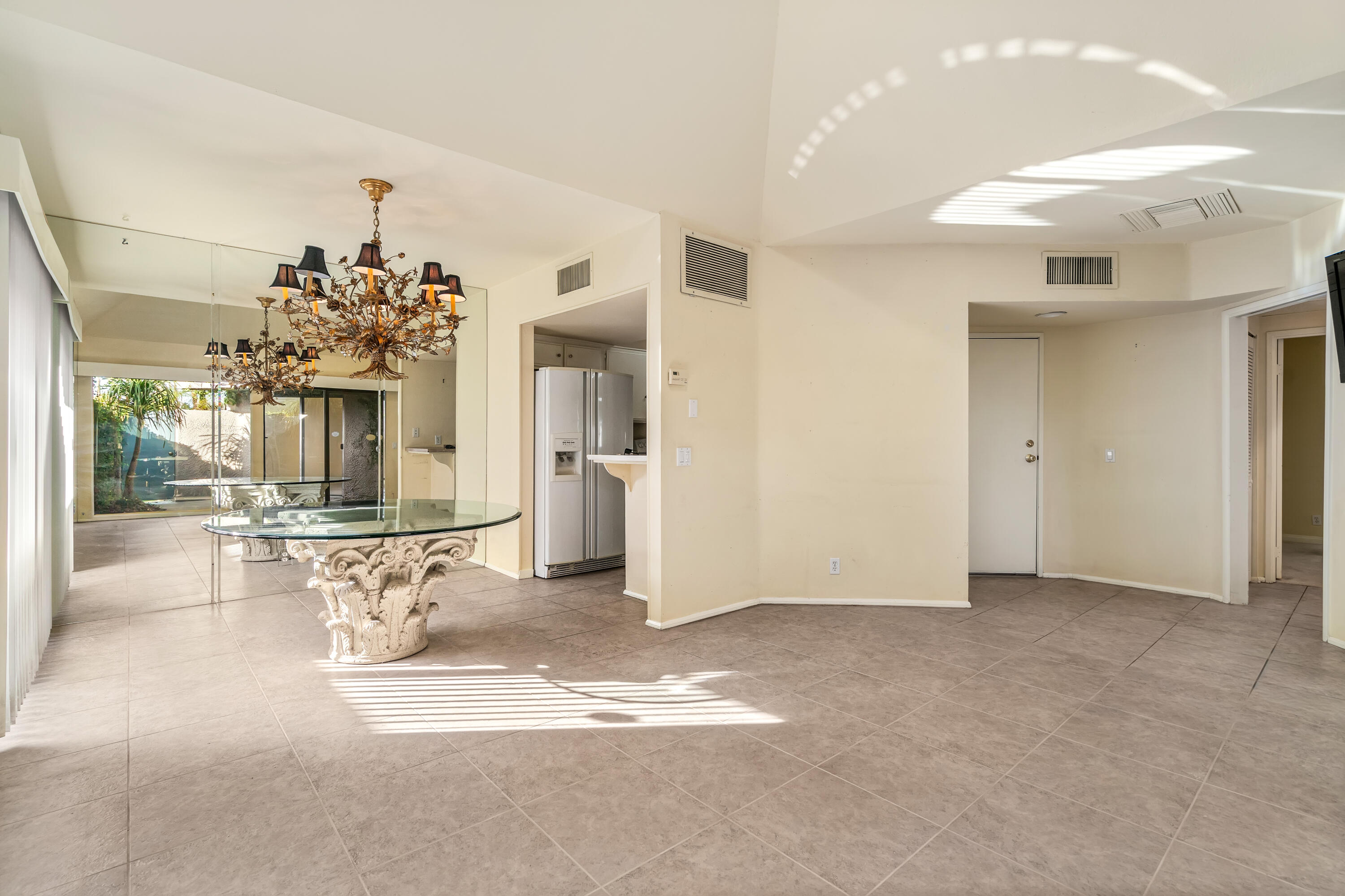 71990 Eleanora Lane Rancho Mirage, CA 92270 - Photo 5 of 22 a view of a livingroom with a chandelier