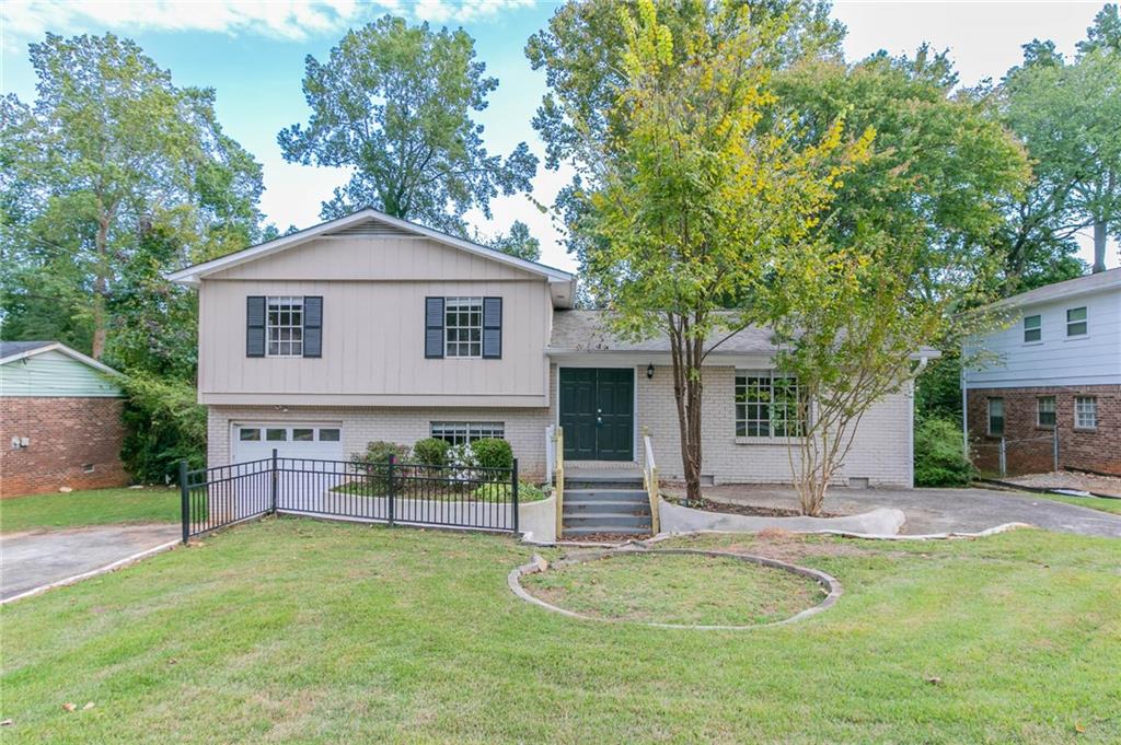 3891 Northstrand Drive Decatur, GA 30035 - Photo 1 of 1 front view of a house with a yard