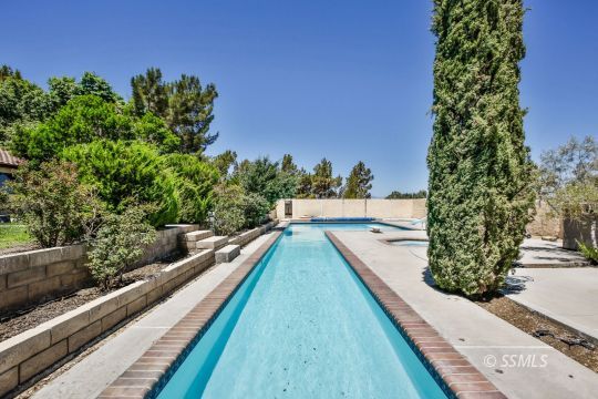 712 East Kendall Avenue Ridgecrest, CA 93555 - Photo 40 of 50 a view of swimming pool with a potted plants
