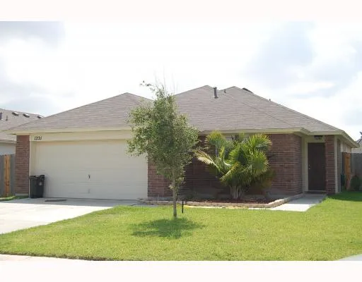 a house view with a garden space
