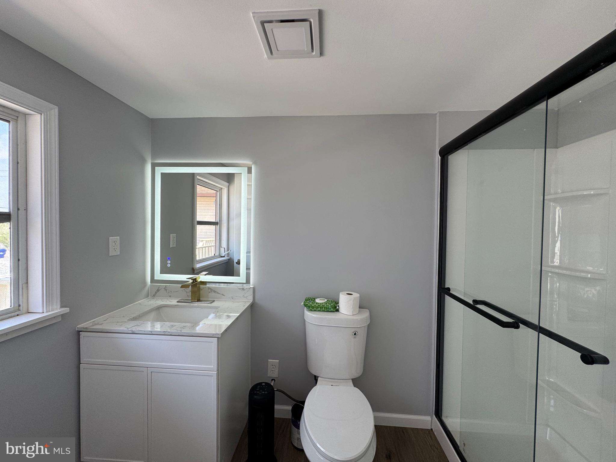 128 Sawyer Road Milford, DE 19963 - Photo 14 of 47 a bathroom with a sink a toilet and shower
