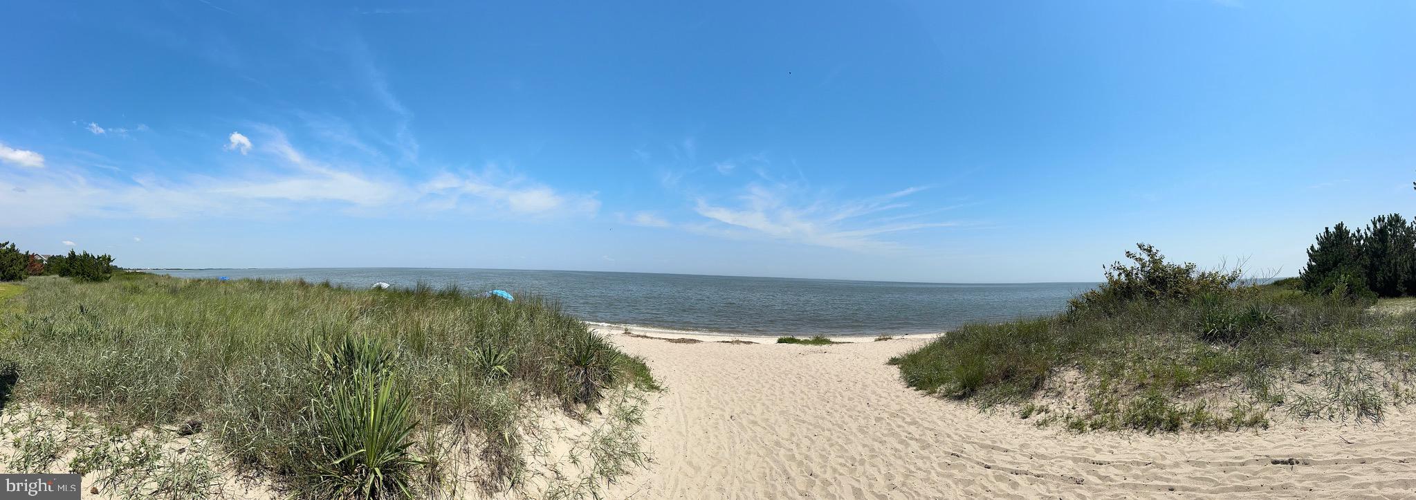 128 Sawyer Road Milford, DE 19963 - Photo 30 of 47 a view of a lake and mountain in the back
