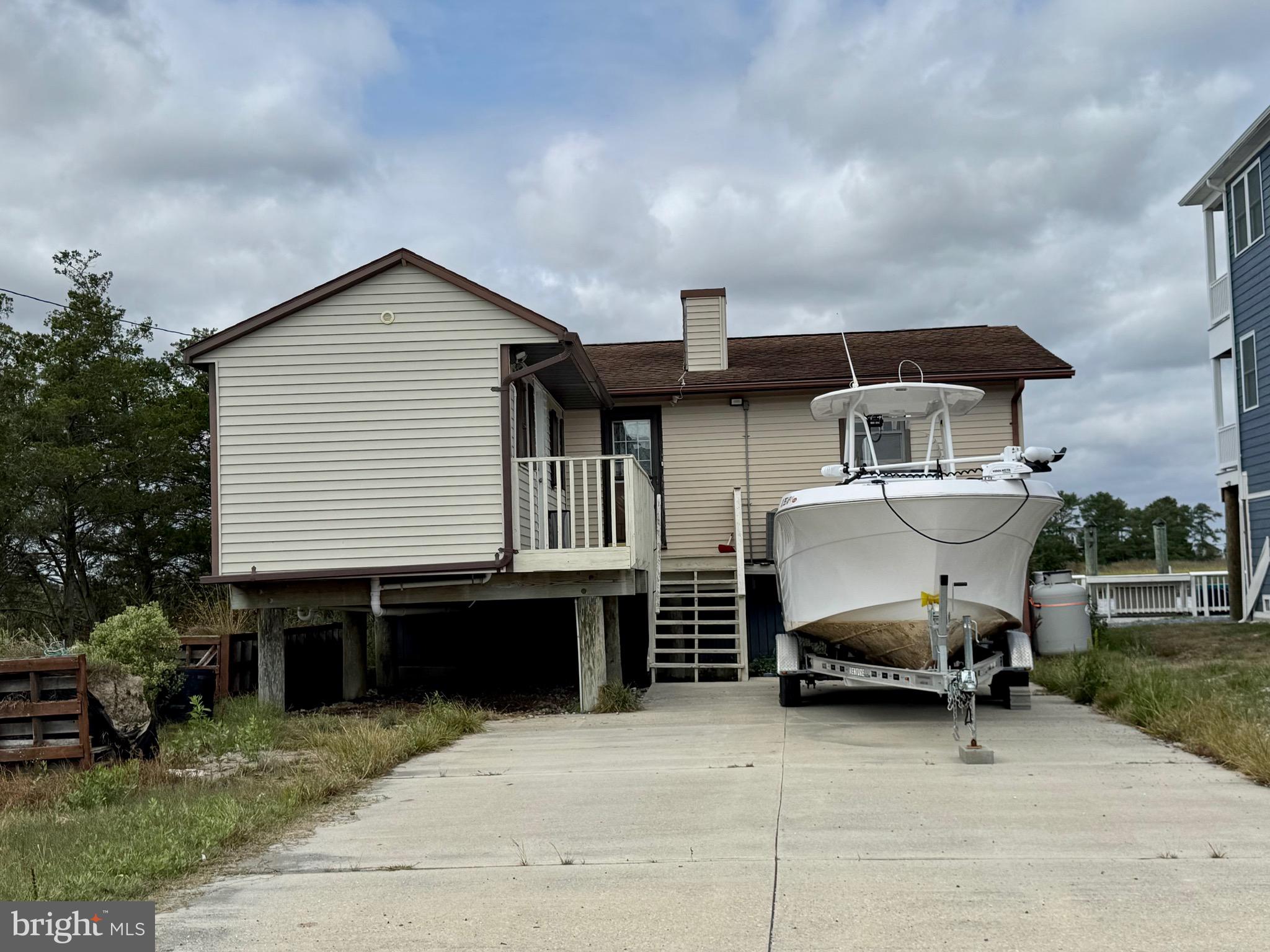 128 Sawyer Road Milford, DE 19963 - Photo 3 of 47 a car parked in front of house