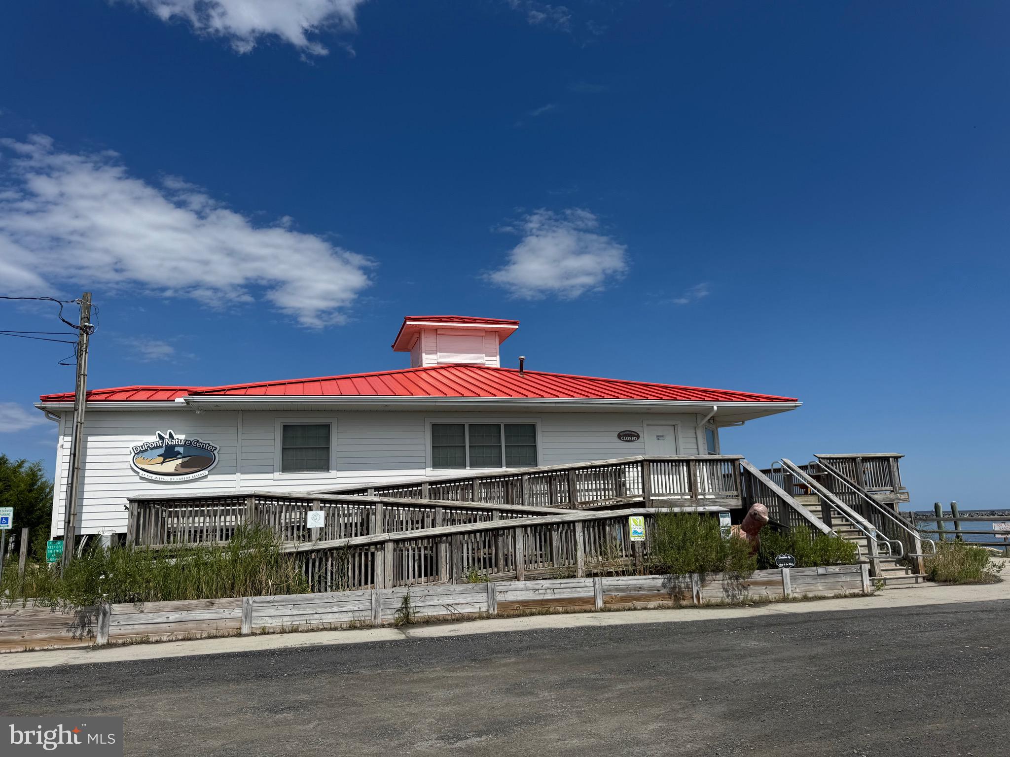 128 Sawyer Road Milford, DE 19963 - Photo 46 of 47 a front view of a house with a balcony
