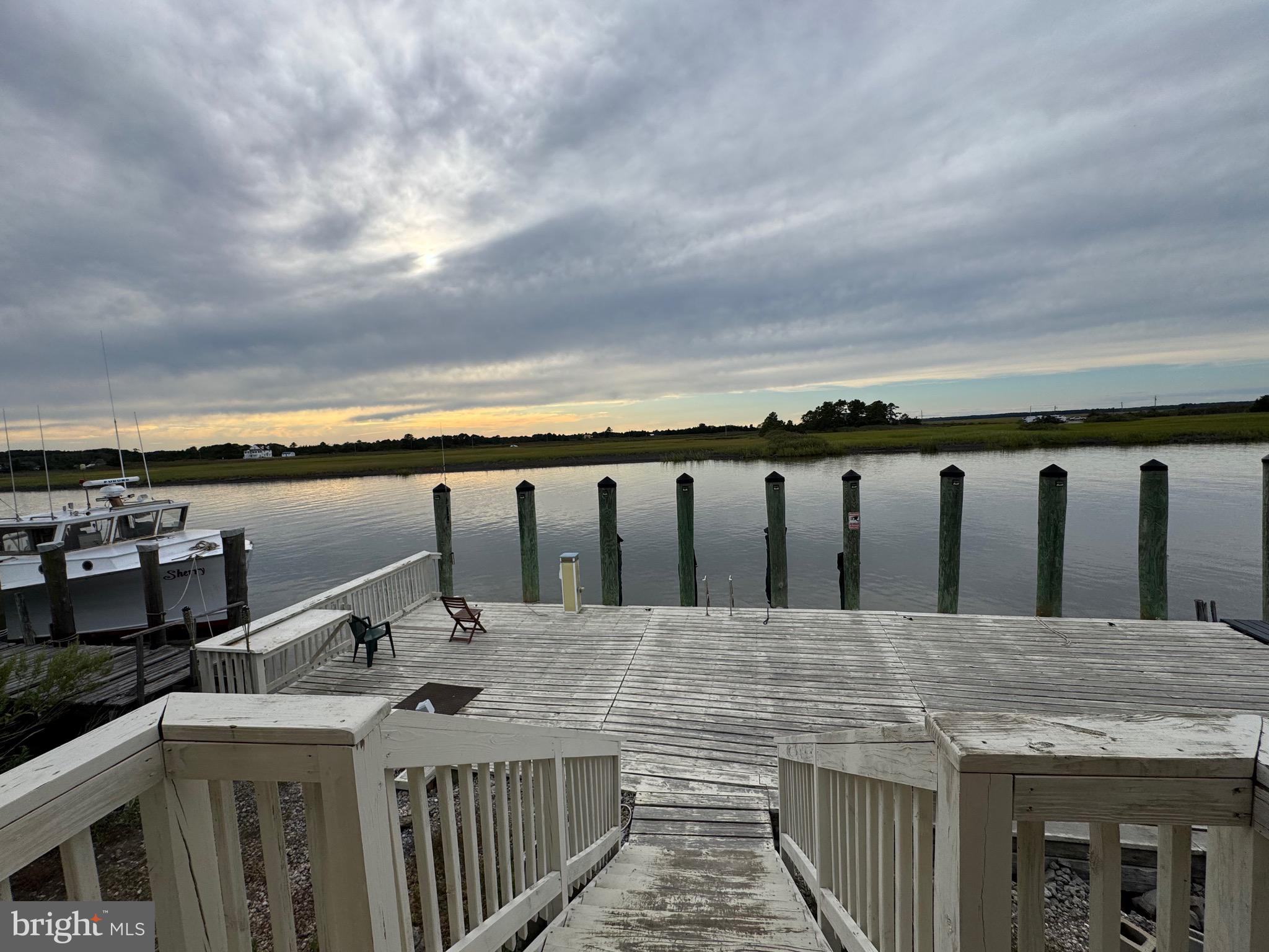 128 Sawyer Road Milford, DE 19963 - Photo 8 of 47 a view of a house with wooden fence