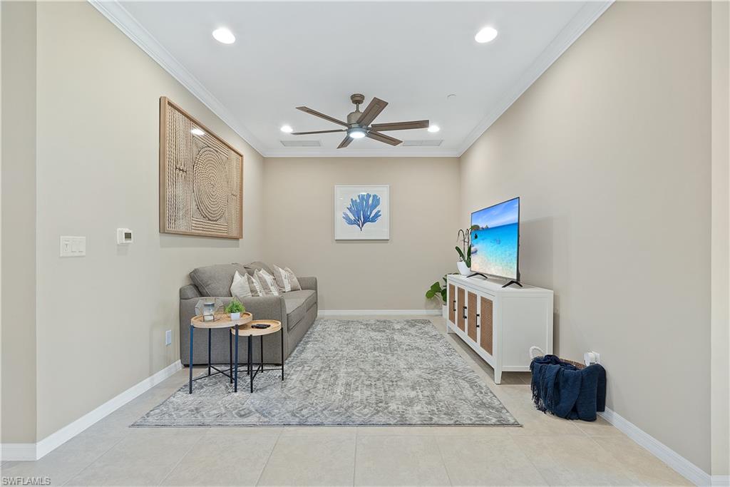 9386 Pocida Court, Unit 103 Naples, FL 34119 - Photo 12 of 43 a living room with furniture