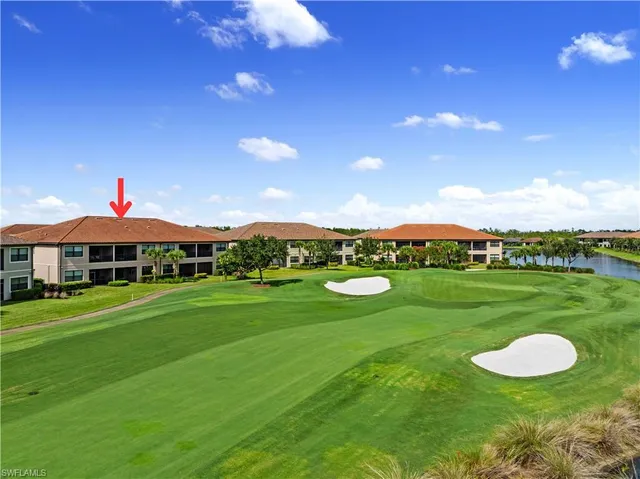 a view of a big house with a big yard
