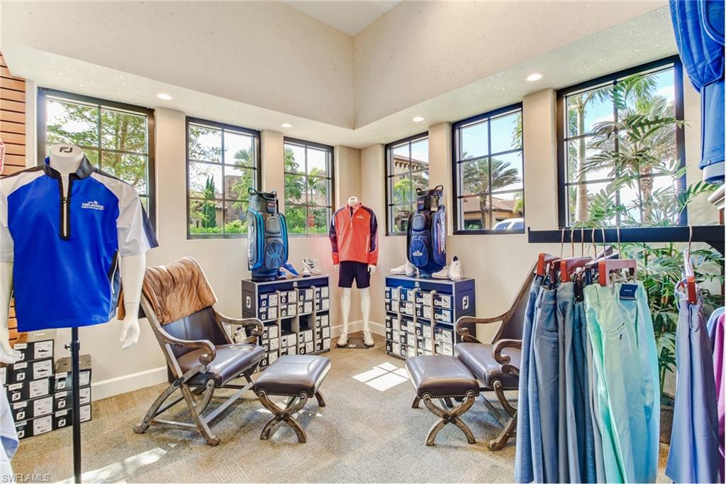 9386 Pocida Court, Unit 103 Naples, FL 34119 - Photo 37 of 43 a view of gym equipment and windows