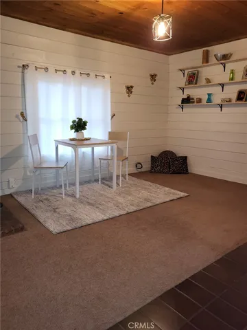a kitchen with granite countertop a sink and a stove