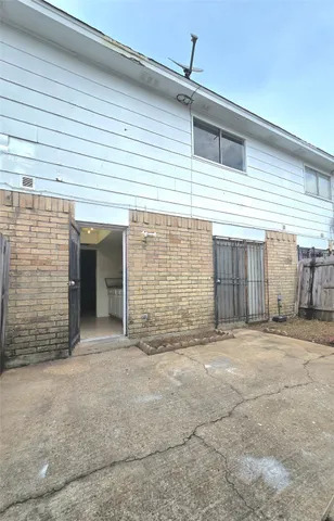 a view of an empty room with stairs