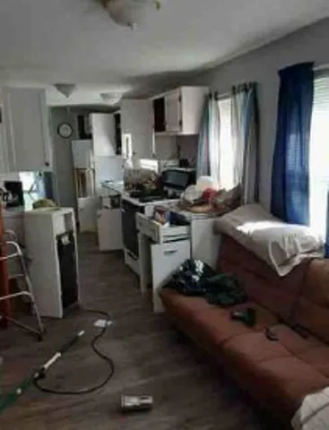 a kitchen with a stove and a refrigerator