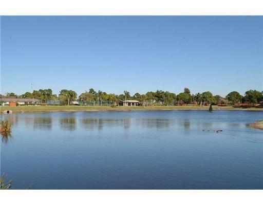 5818 Southeast Windsong Lane, Unit 212 Stuart, FL 34997 - Photo 13 of 20 LAKE