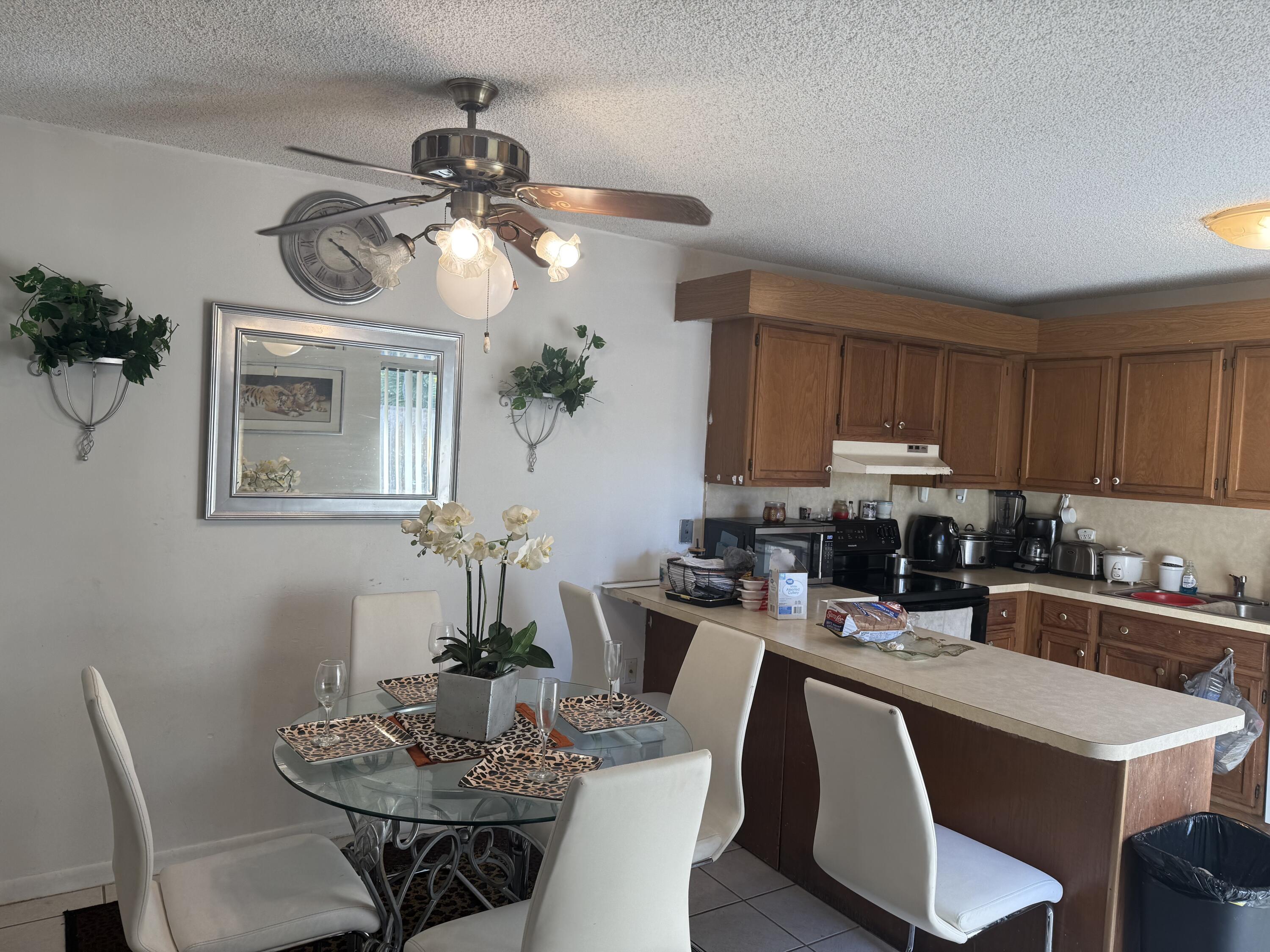 5818 Southeast Windsong Lane, Unit 212 Stuart, FL 34997 - Photo 17 of 20 5818 dining