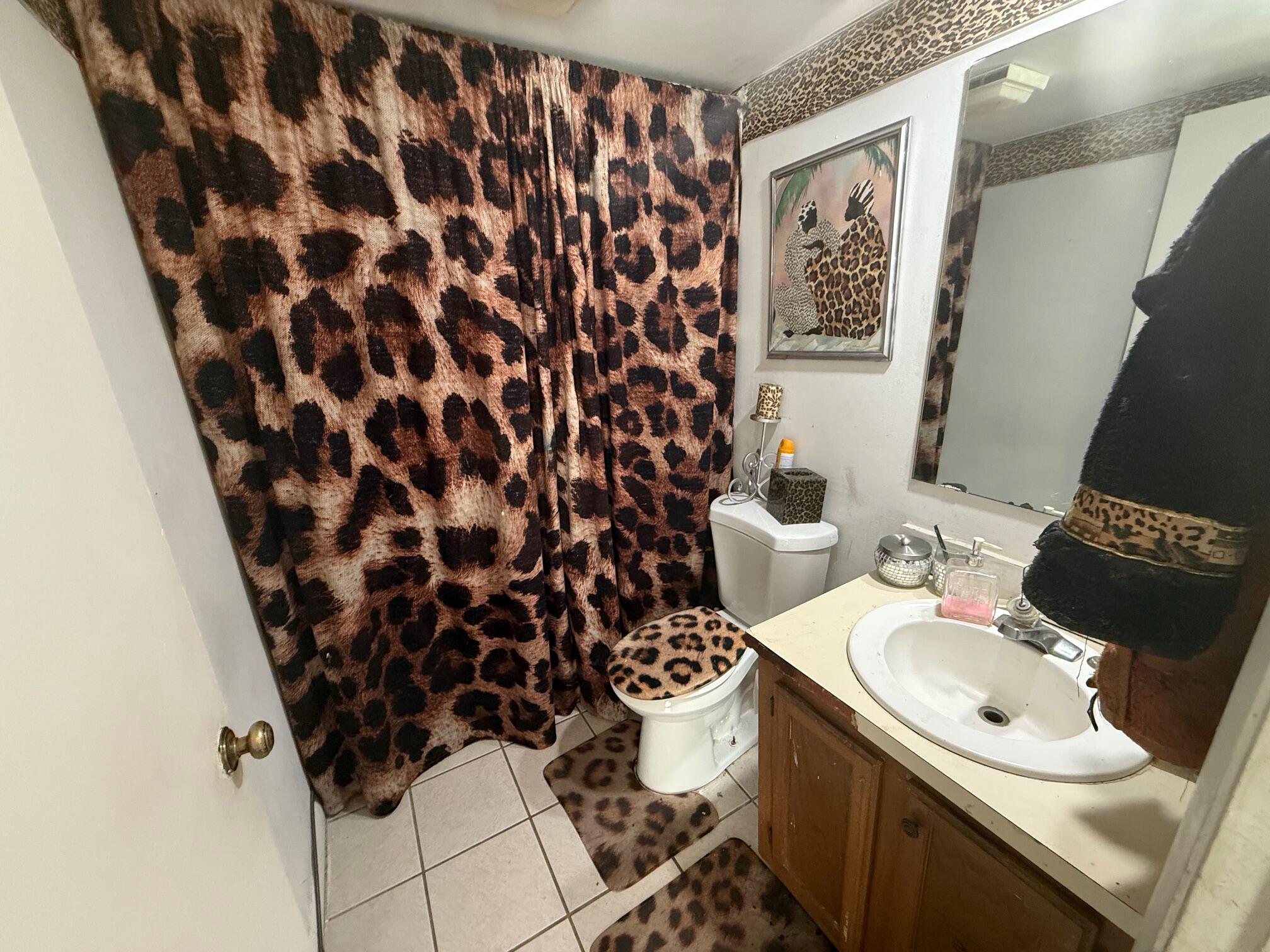 5818 Southeast Windsong Lane, Unit 212 Stuart, FL 34997 - Photo 19 of 20 5818 half bath