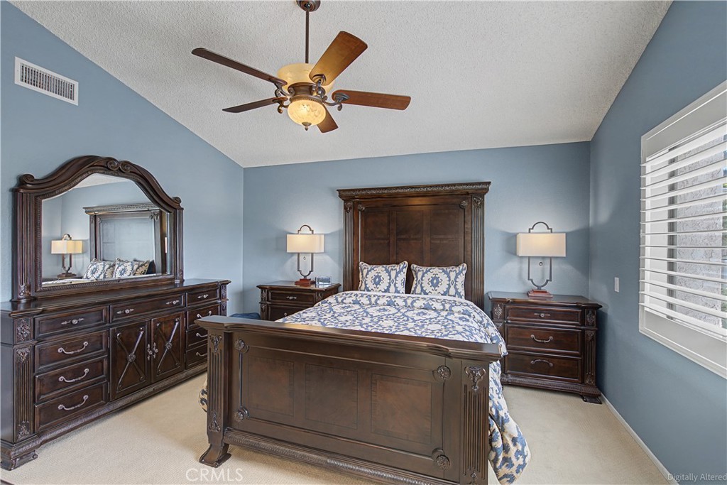 1129 Vía Nice Redlands, CA 92374 - Photo 11 of 23 a bedroom with a bed and a dresser