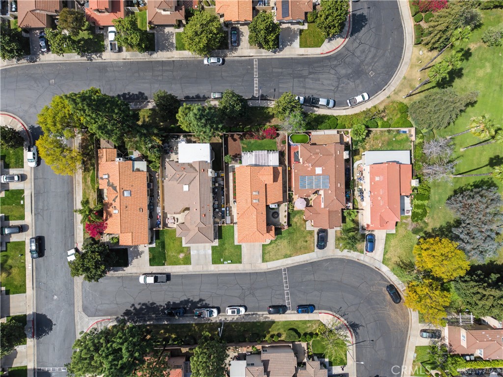 1129 Vía Nice Redlands, CA 92374 - Photo 19 of 23 an aerial view of a house with a yard and potted plants
