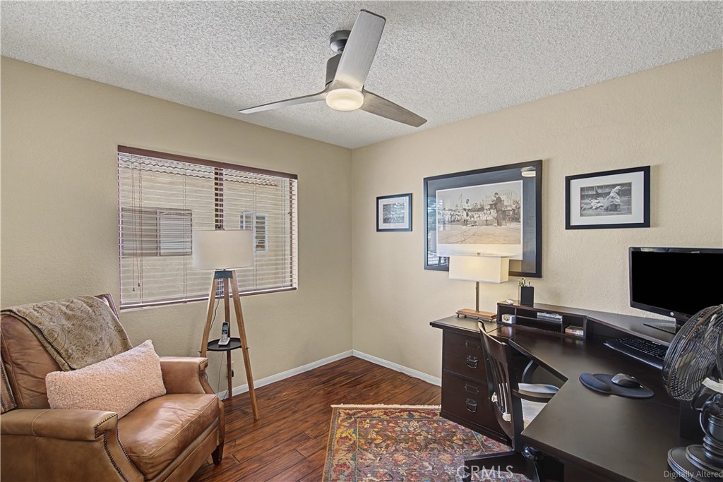 1129 Vía Nice Redlands, CA 92374 - Photo 21 of 23 a view of a workspace with furniture and a window