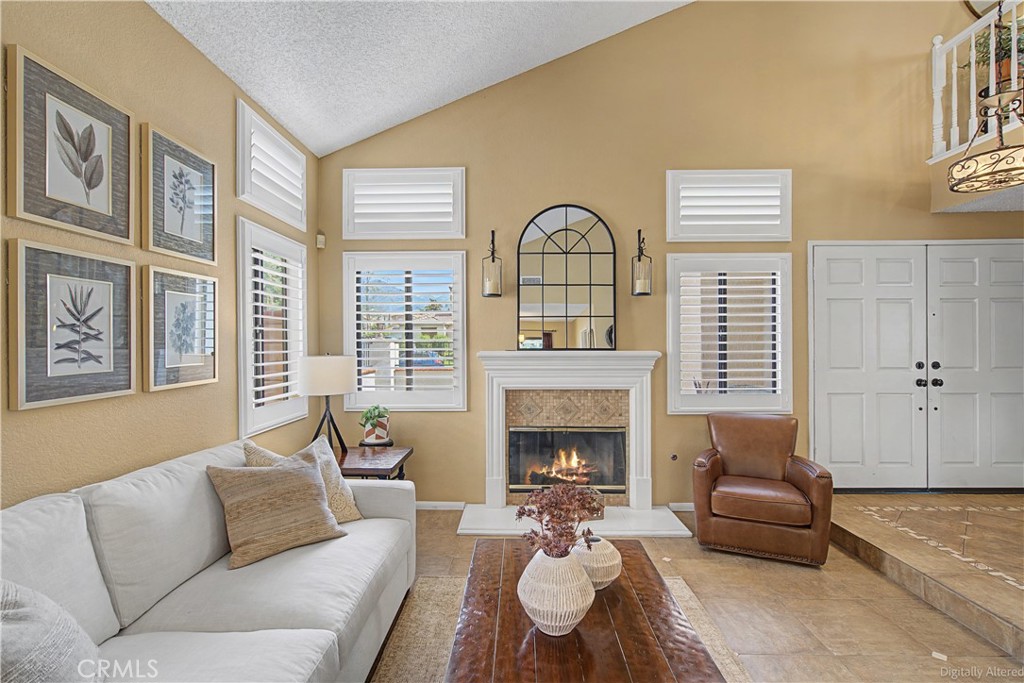 1129 Vía Nice Redlands, CA 92374 - Photo 4 of 23 a living room with furniture and a fireplace