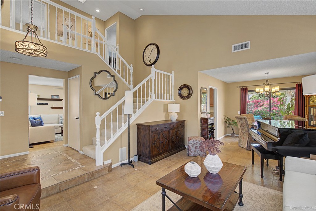 1129 Vía Nice Redlands, CA 92374 - Photo 5 of 23 a view of a dining room with furniture and a large window