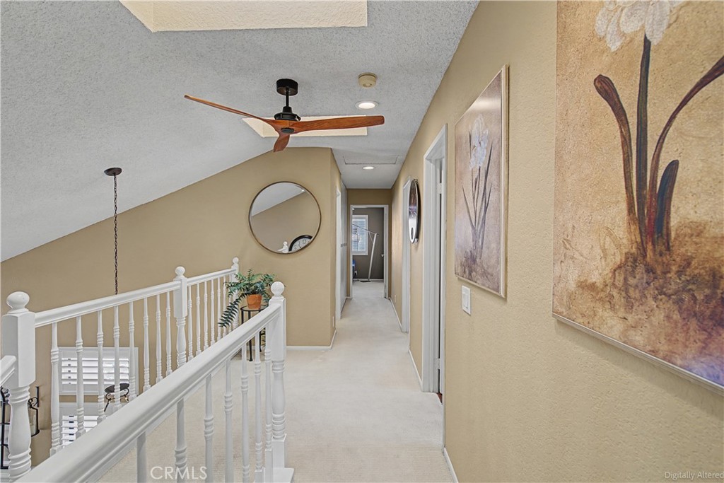 1129 Vía Nice Redlands, CA 92374 - Photo 9 of 23 a view of a hallway with seating space