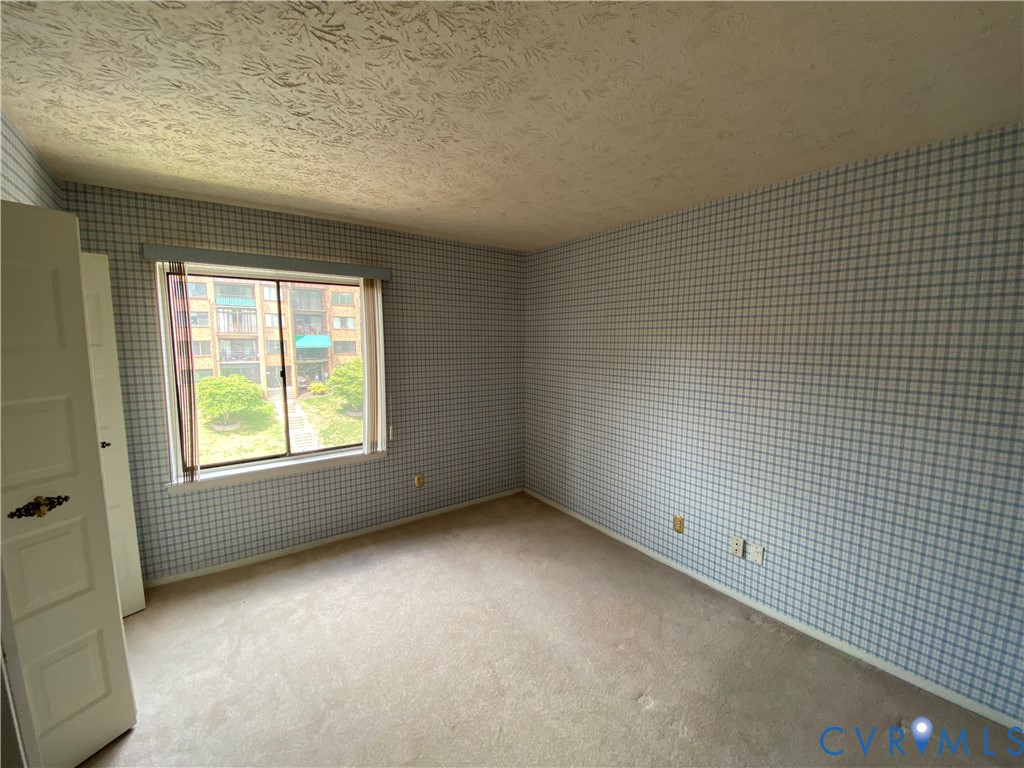 1507 Bronwyn Road, Unit 301 Henrico, VA 23238 - Photo 31 of 41 an empty room with a window