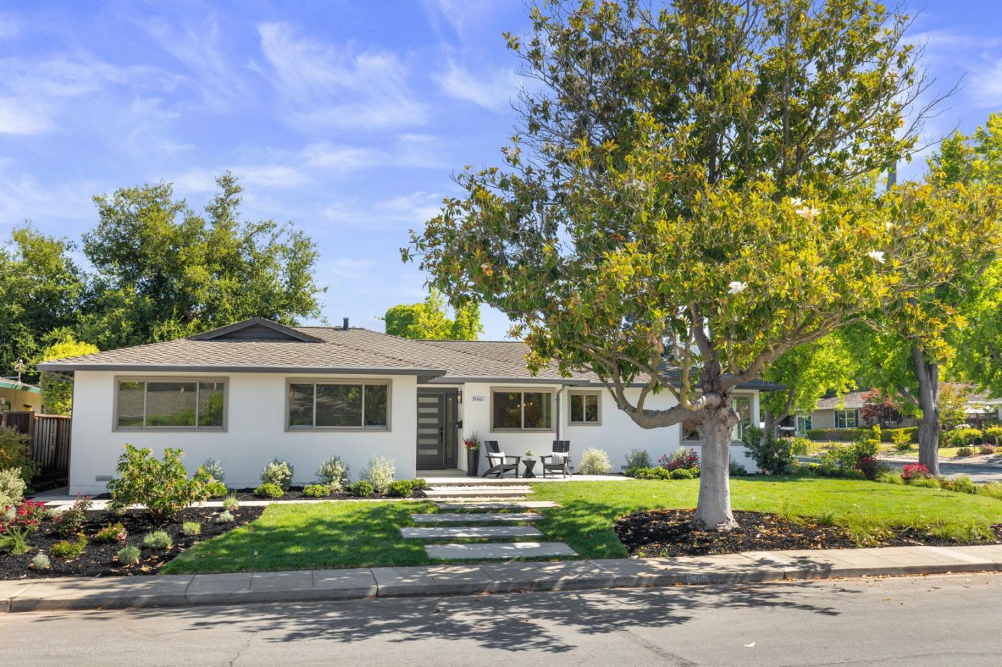 front view of a house with a yard