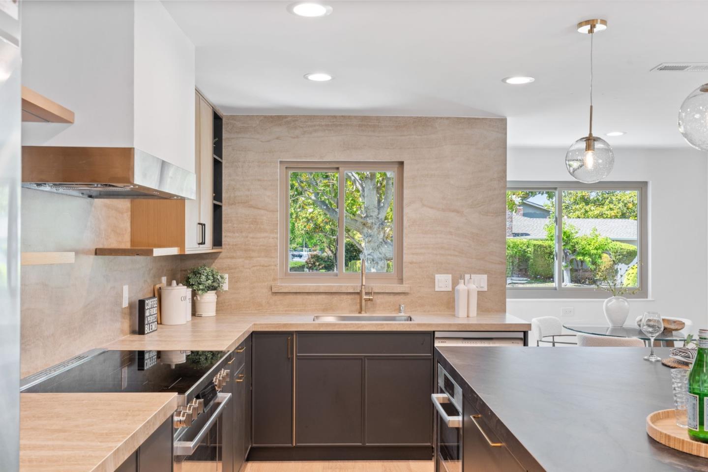 1961 Fordham Way Mountain View, CA 94040 - Photo 12 of 29 a kitchen with a sink stove and cabinets