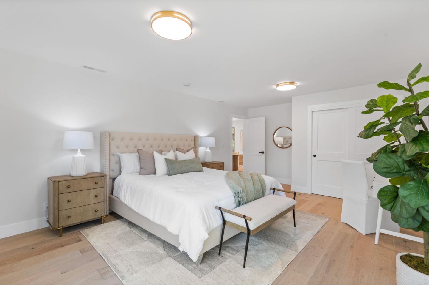 1961 Fordham Way Mountain View, CA 94040 - Photo 23 of 29 a bedroom with bed and a potted plant